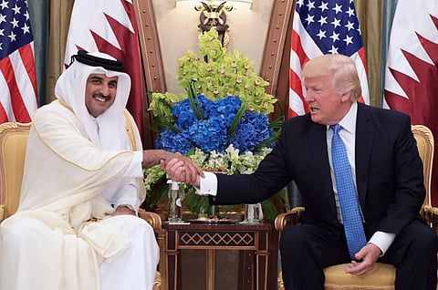 أمير قطر والرئيس الأمريكي يبحثان تطورات الأوضاع الإقليمية والدولية